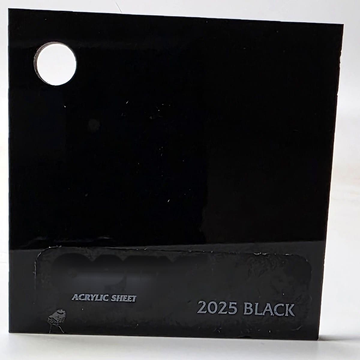 Optix 2025 gloss black acrylic sample