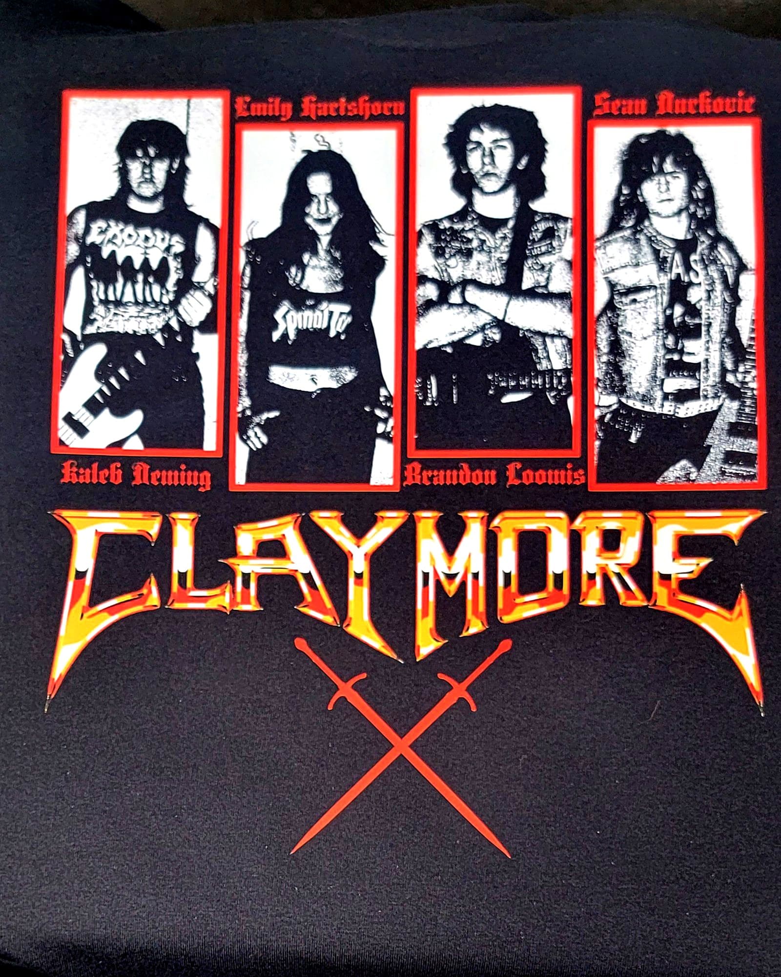 Multi-color band artwork printed on a black t-shirt