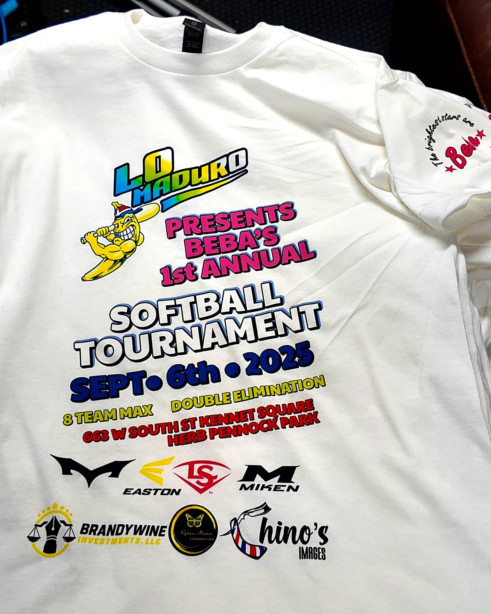 White event t-shirt with a full-color tournament design and a sleeve print