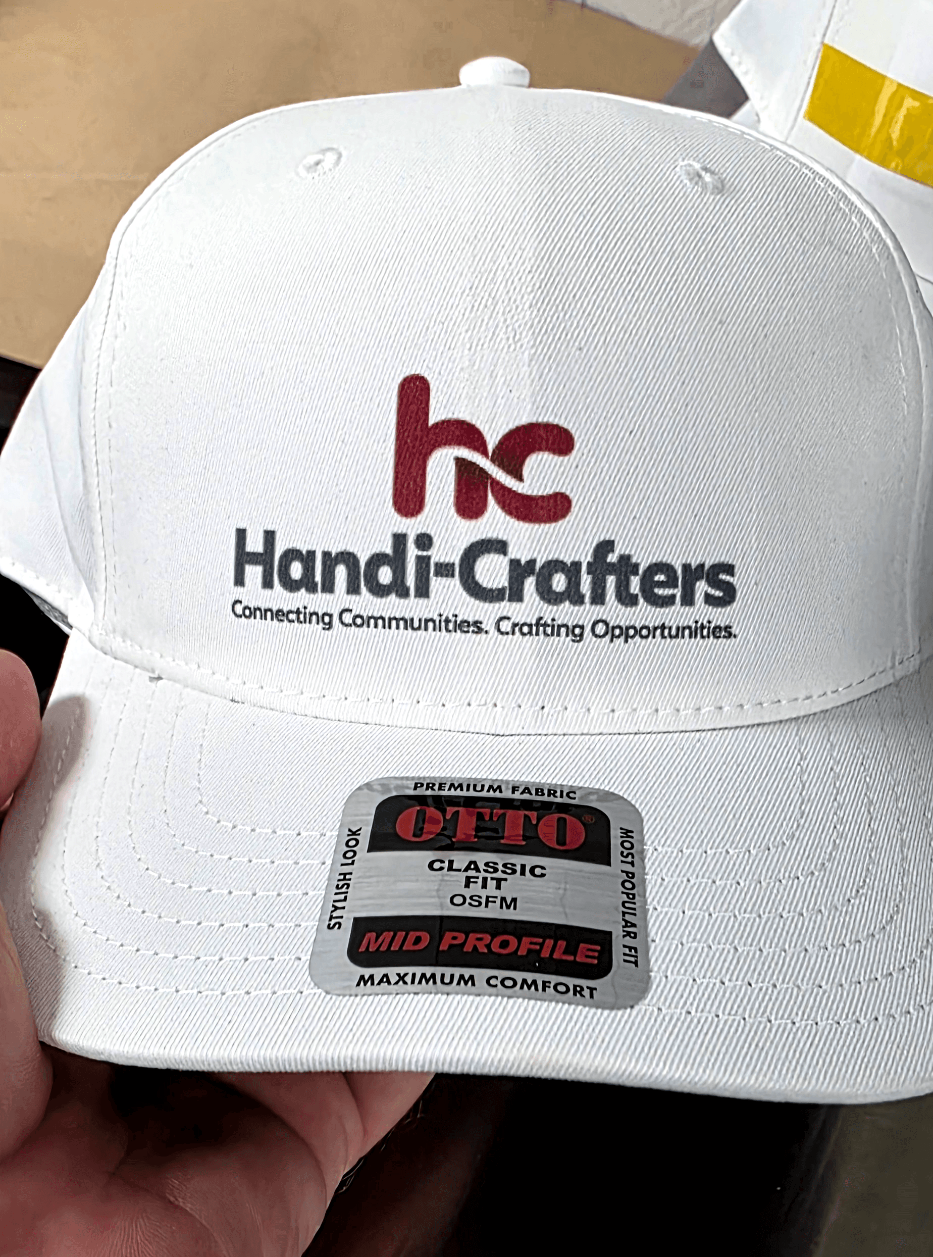 White performance cap with a full-color sublimated Handi-Crafters logo — Print Habit, Coatesville PA