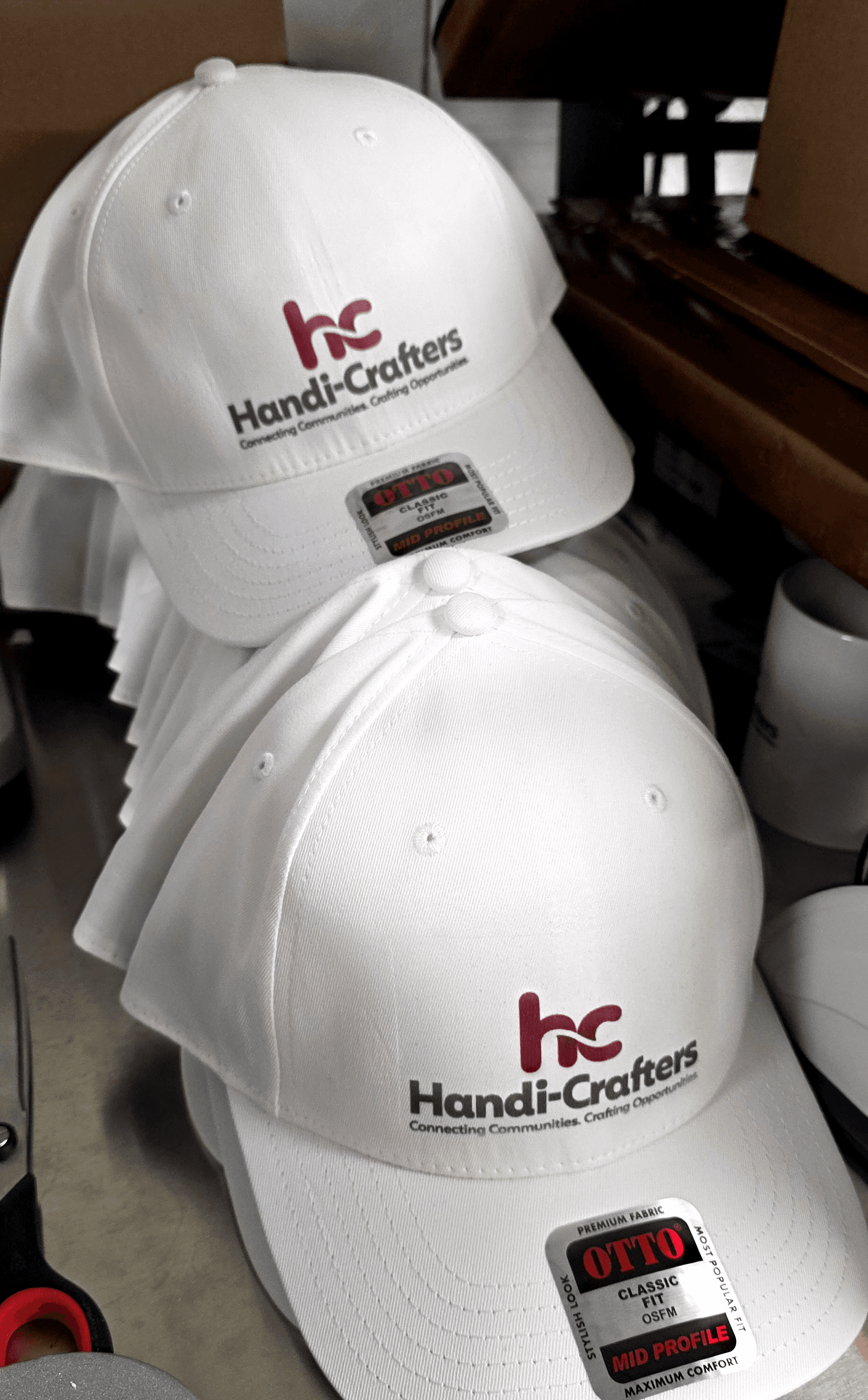 A production run of white sublimated caps ready to ship — Print Habit, Coatesville PA