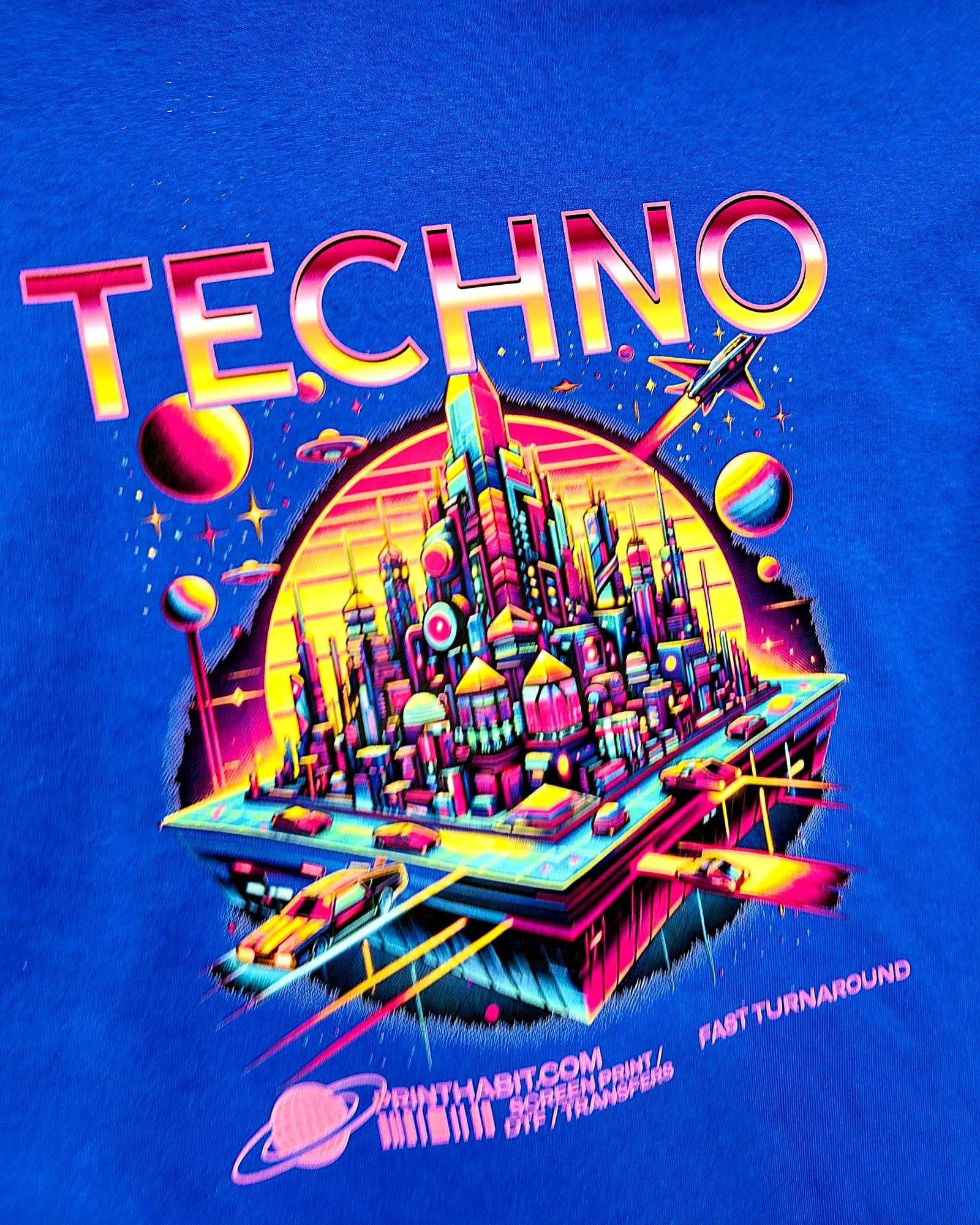 Full-color detailed artwork printed on a royal blue t-shirt