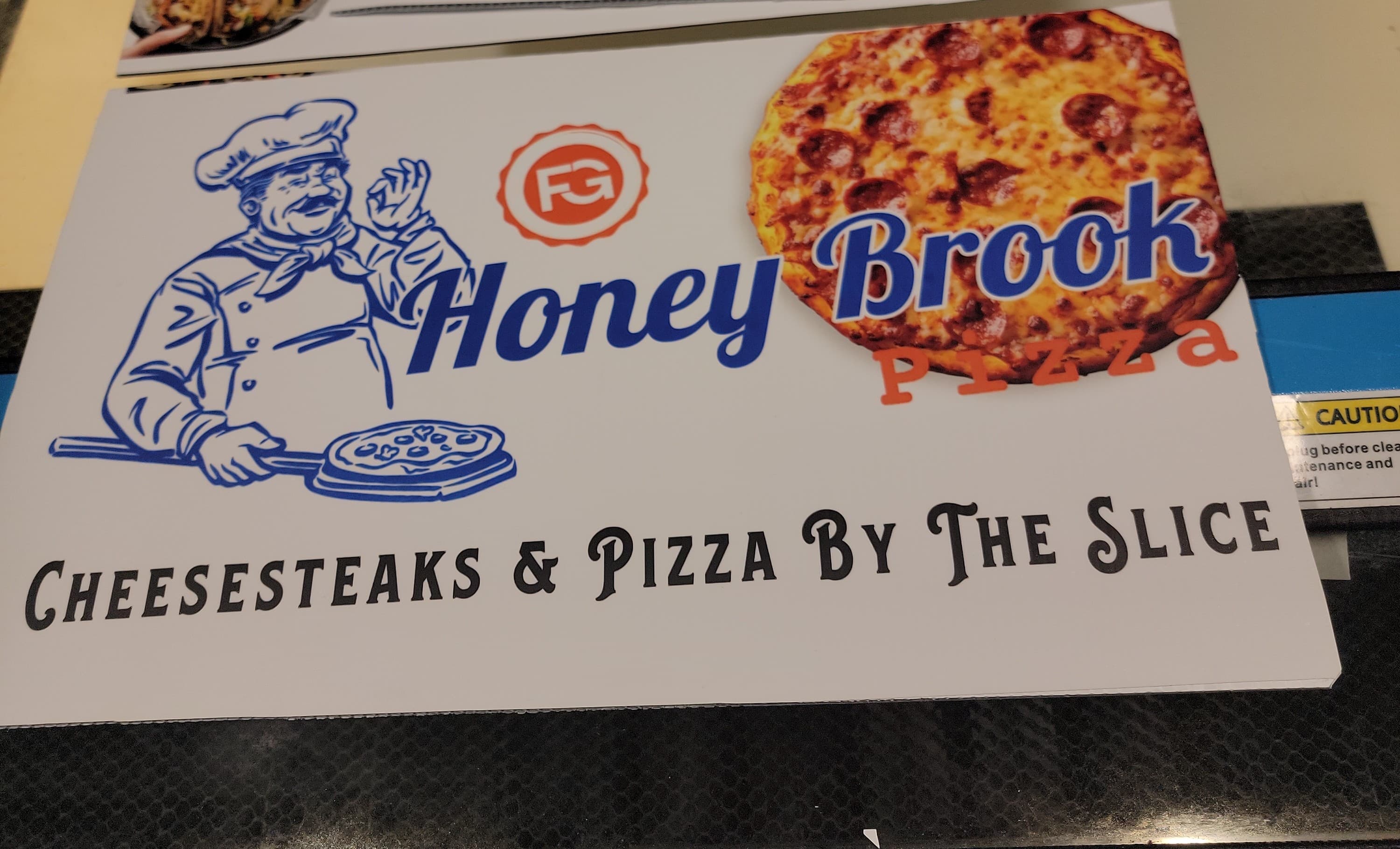 Freshly printed Honey Brook Pizza sign panel by Print Habit
