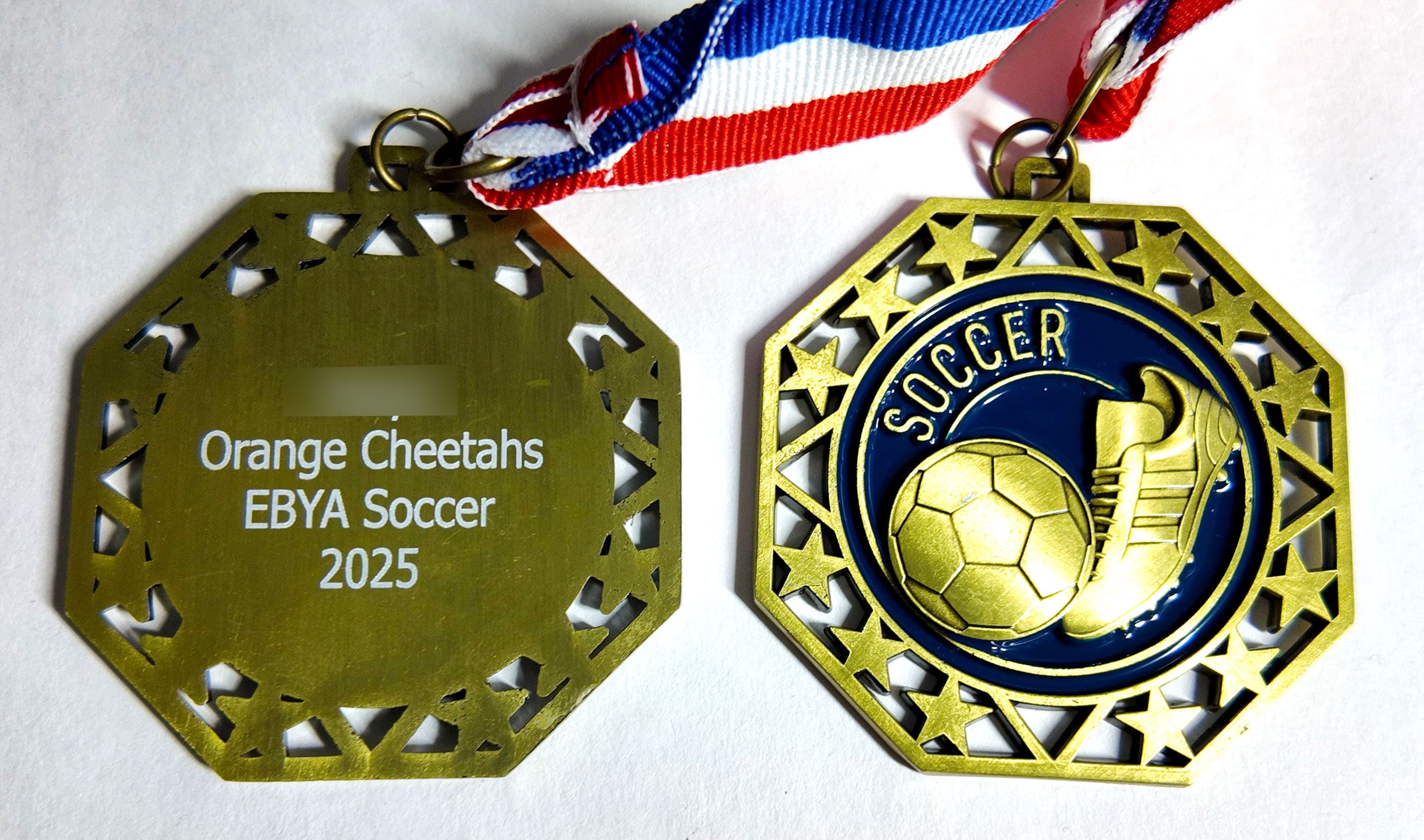 Custom soccer medal front and laser-engraved personalized back (Orange Cheetahs, EBYA Soccer 2025) by Print Habit