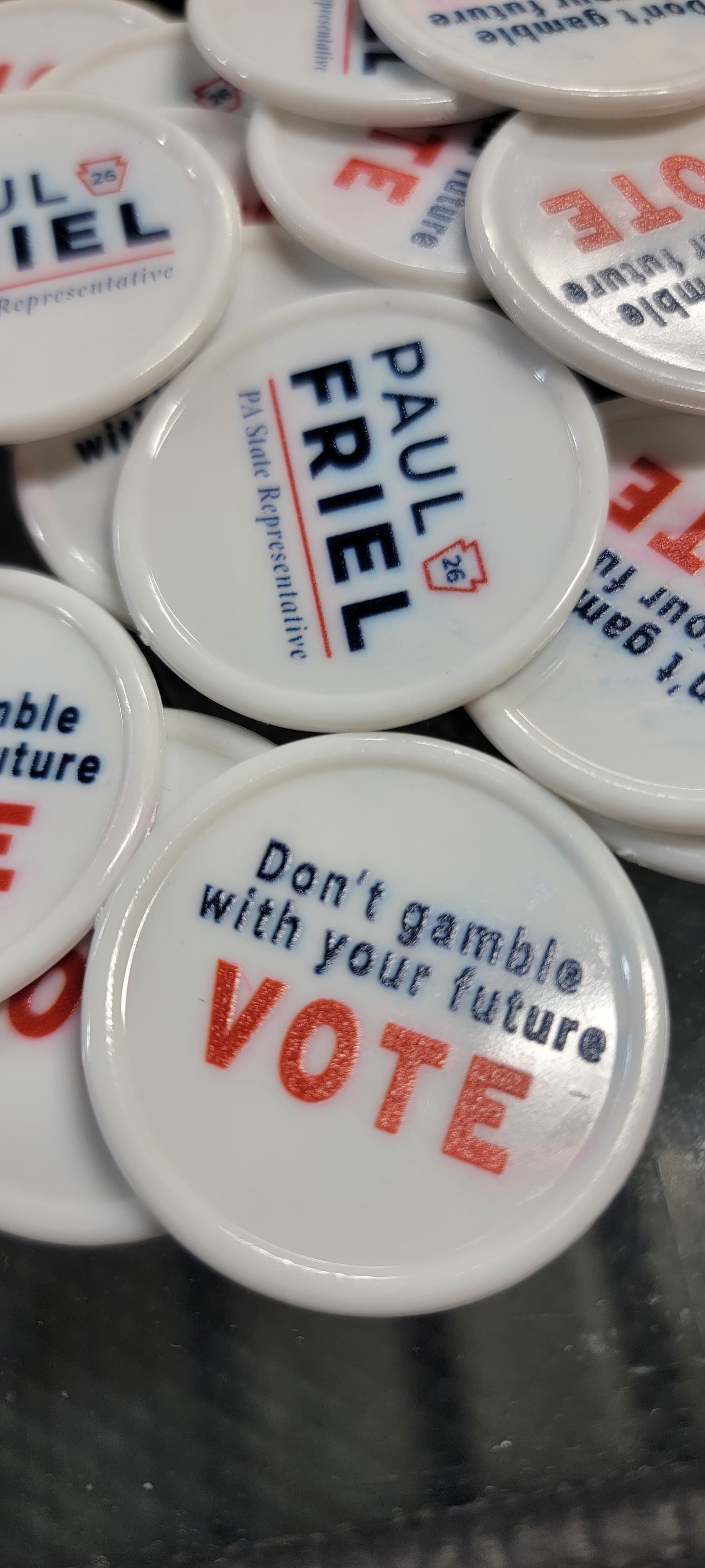 Custom UV-printed campaign buttons and coasters for Paul Friel by Print Habit