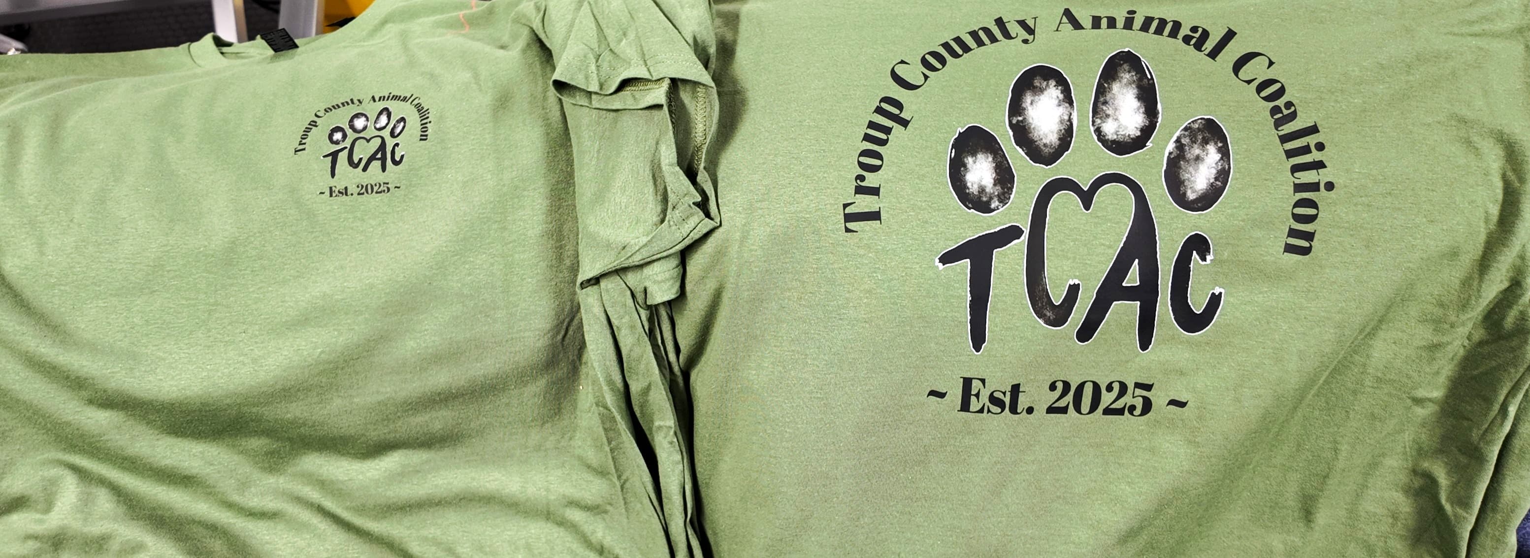 Custom green Troup County Animal Coalition (TCAC) t-shirts with paw-print logo, printed by Print Habit