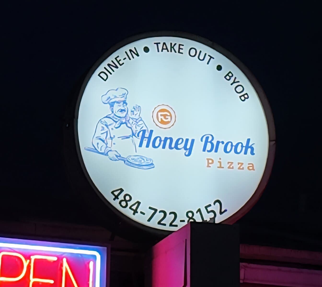 Round backlit UV-printed acrylic sign