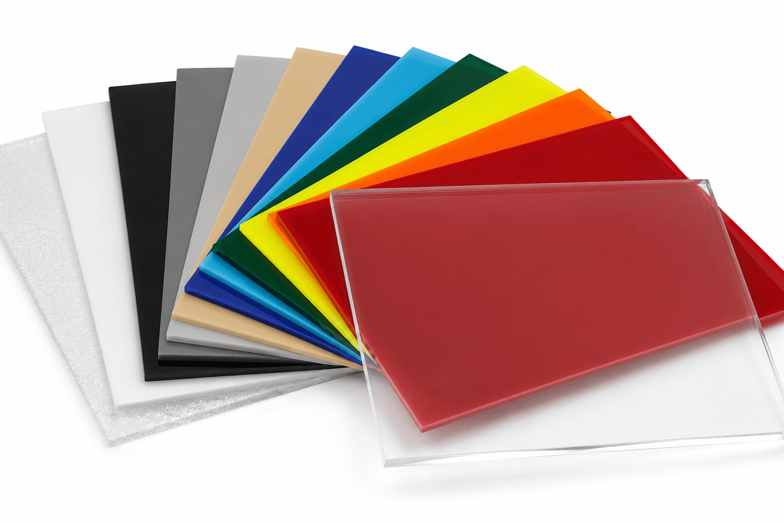 Colored acrylic sheets fanned out — red, orange, yellow, greens, blues, tan, greys, black, white, and clear