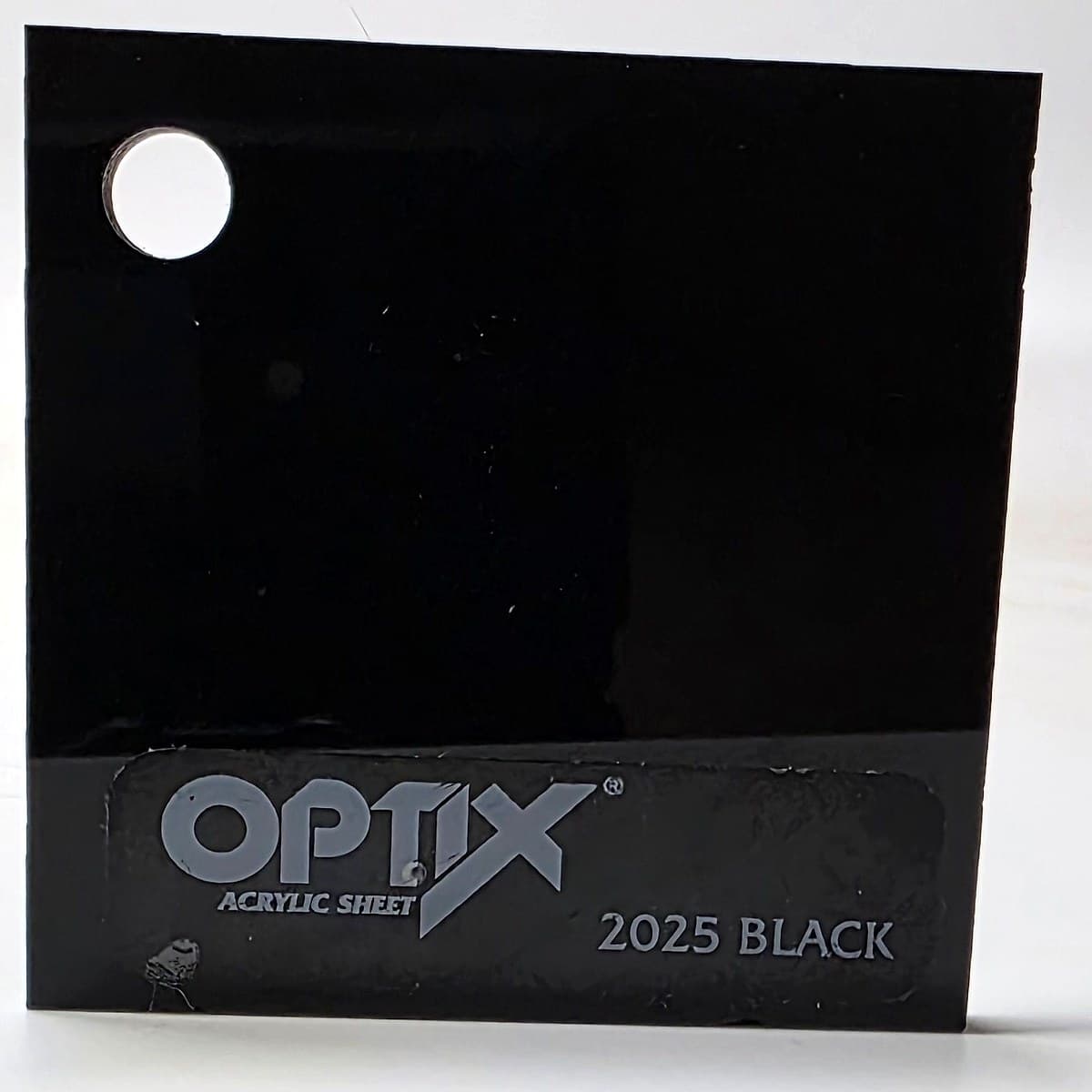 Optix 2025 gloss black acrylic sample