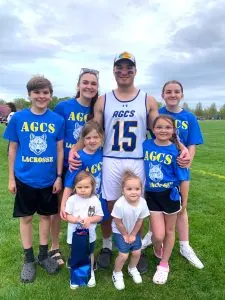 image of family wearing custom senior day lacrosse shirts spirit wear