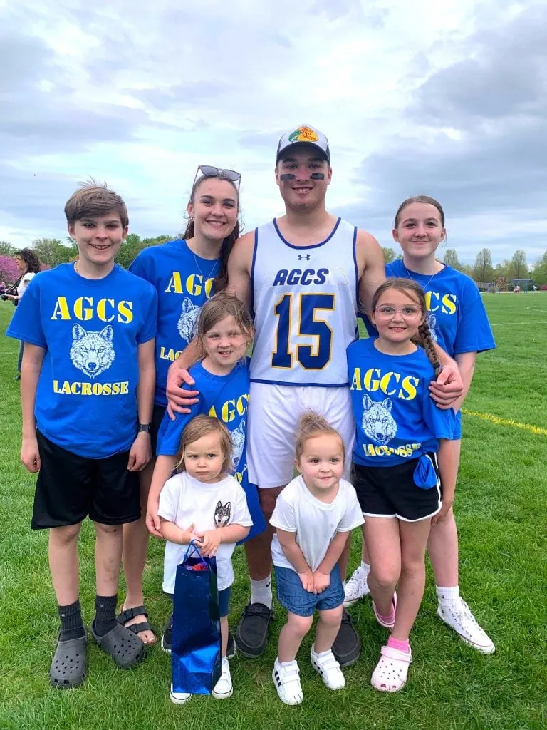image of family wearing custom senior day lacrosse shirts spirit wear